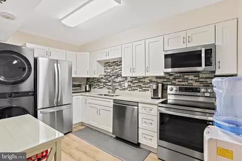 Kitchen - 15100 Interlachen Dr #4-301, Silver Spring, MD 20906 photo 1 of 2