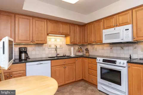 Kitchen - 15100 Interlachen Dr #4-414, Silver Spring, MD 20906 photo 1 of 1