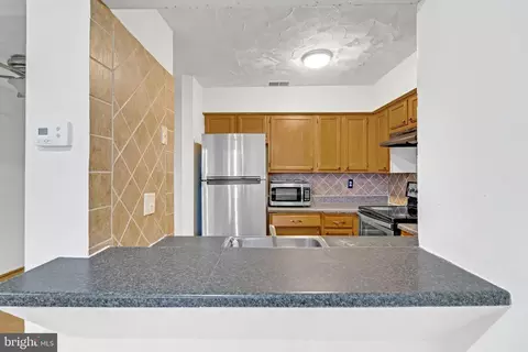 Kitchen - 13004 Conductor Way #105, Silver Spring, MD 20904 photo 2 of 2