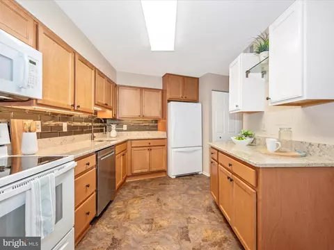 Kitchen - 15115 Interlachen Dr #3-704, Silver Spring, MD 20906 photo 1 of 4