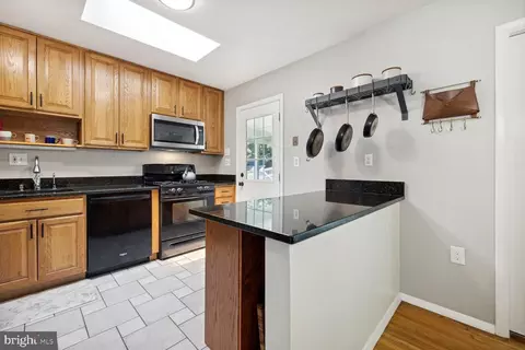 Kitchen - 240 Rolling Rd, Gaithersburg, MD 20877 photo 2 of 2