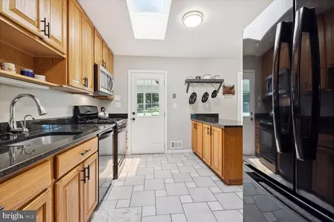 Kitchen - 240 Rolling Rd, Gaithersburg, MD 20877 photo 1 of 2