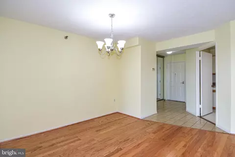 Living - 15107 Interlachen Dr #2-1024, Silver Spring, MD 20906 photo 6 of 7