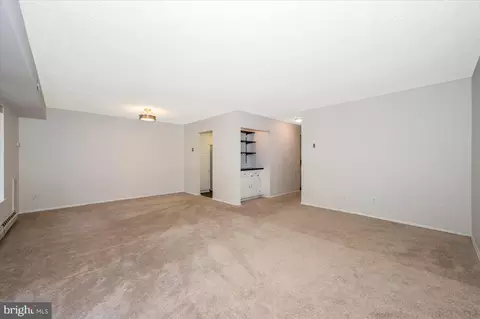 Living - 3511 Forest Edge Dr #17-1F, Silver Spring, MD 20906 photo 5 of 10