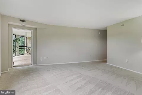 Living - 15101 Interlachen Dr #1-504, Silver Spring, MD 20906 photo 8 of 9