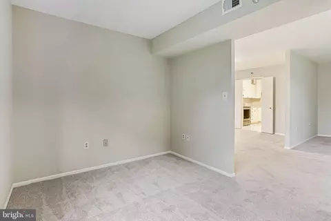 Living - 15101 Interlachen Dr #1-504, Silver Spring, MD 20906 photo 5 of 9