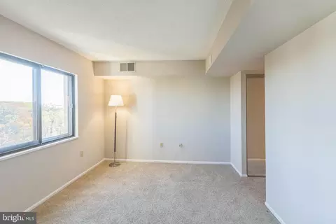 Living - 15101 Interlachen Dr #1-1009, Silver Spring, MD 20906 photo 3 of 4