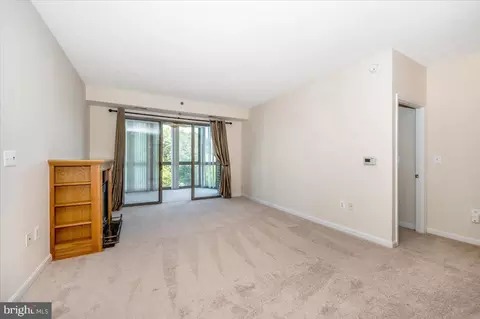 Living - 3100 N Leisure World Blvd #220, Silver Spring, MD 20906 photo 4 of 9