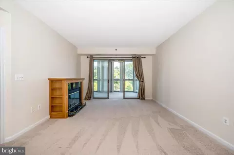 Living - 3100 N Leisure World Blvd #220, Silver Spring, MD 20906 photo 2 of 9