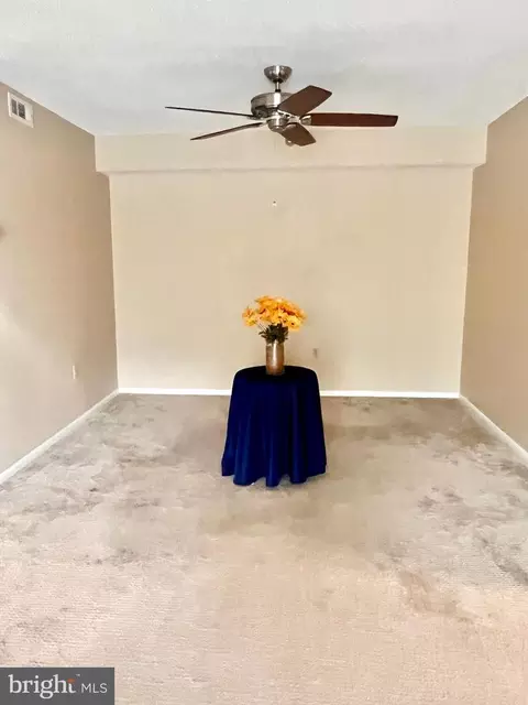 Living - 15100 Interlachen Dr #4-417, Silver Spring, MD 20906 photo 2 of 3