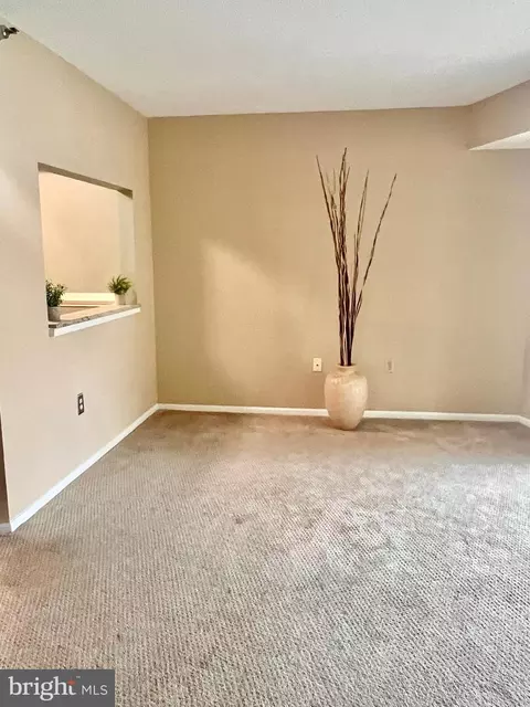 Living - 15100 Interlachen Dr #4-417, Silver Spring, MD 20906 photo 3 of 3
