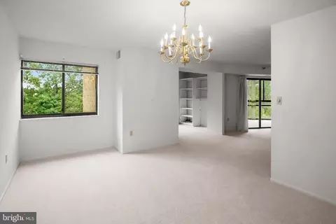 Living - 15101 Interlachen Dr #1-618, Silver Spring, MD 20906 photo 5 of 7