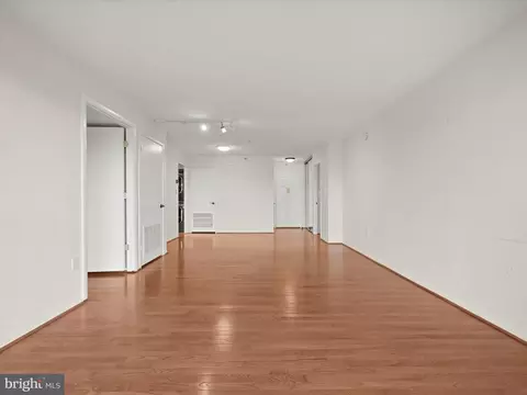 Living - 15107 Interlachen Dr #2-919, Silver Spring, MD 20906 photo 6 of 8