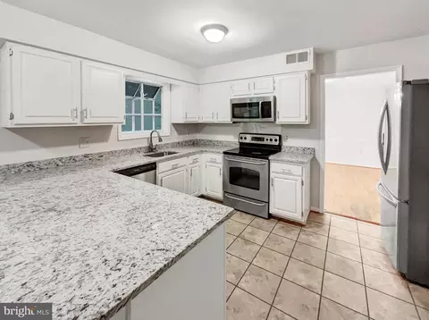 Kitchen - 13109 Mica Ct, Silver Spring, MD 20904 photo 2 of 2
