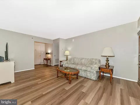 Living - 15101 Interlachen Dr #1-116, Silver Spring, MD 20906 photo 6 of 7