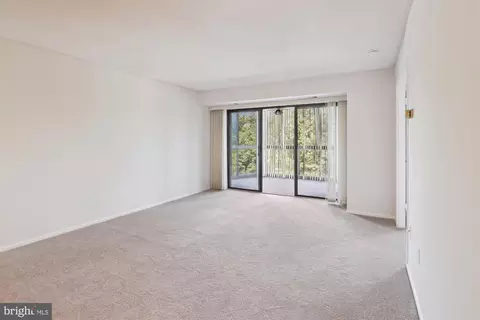 Living - 15115 Interlachen Dr #3-415, Silver Spring, MD 20906 photo 2 of 7