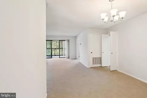 Living - 15115 Interlachen Dr #3-415, Silver Spring, MD 20906 photo 6 of 7