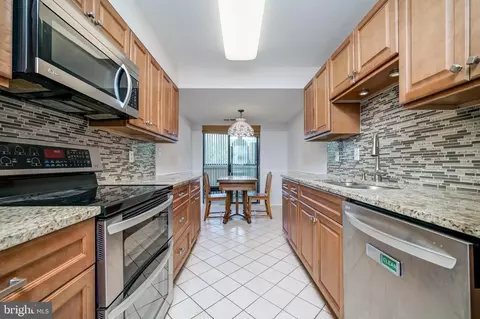 Kitchen - 15100 Interlachen Dr #4-207, Silver Spring, MD 20906 photo 1 of 6