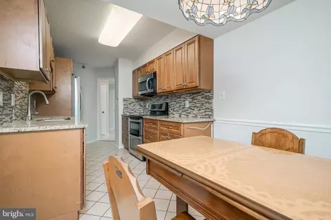 Kitchen - 15100 Interlachen Dr #4-207, Silver Spring, MD 20906 photo 6 of 6