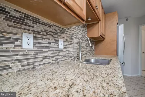 Kitchen - 15100 Interlachen Dr #4-207, Silver Spring, MD 20906 photo 5 of 6