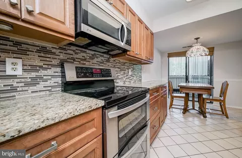 Kitchen - 15100 Interlachen Dr #4-207, Silver Spring, MD 20906 photo 3 of 6