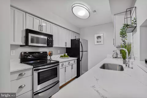 Kitchen - 1647 Carriage House Ter #E, Silver Spring, MD 20904 photo 2 of 2
