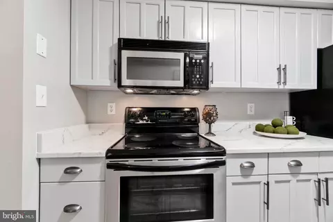 Kitchen - 1647 Carriage House Ter #E, Silver Spring, MD 20904 photo 1 of 2