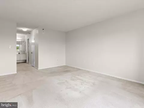 Living - 15101 Interlachen Dr #1-914, Silver Spring, MD 20906 photo 11 of 13