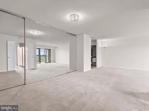 Living - 15101 Interlachen Dr #1-914, Silver Spring, MD 20906 photo 7 of 13