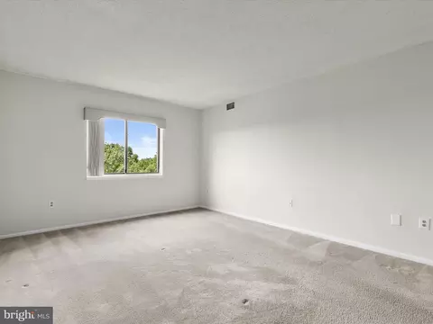 Bedroom - 15101 Interlachen Dr #1-914, Silver Spring, MD 20906 photo 3 of 8