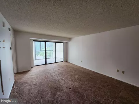 Living - 15101 Interlachen Dr #1-301, Silver Spring, MD 20906 photo 2 of 5