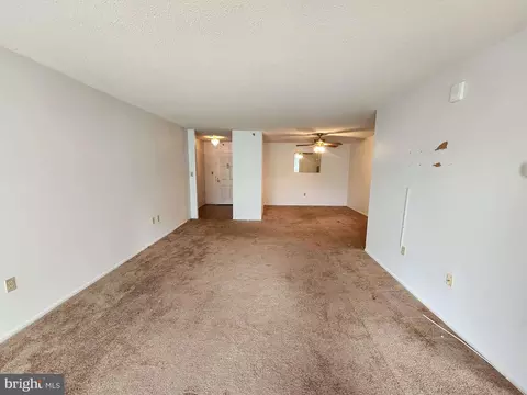 Living - 15101 Interlachen Dr #1-301, Silver Spring, MD 20906 photo 3 of 5