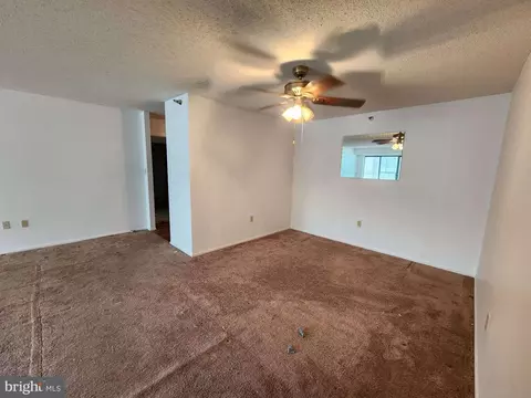 Living - 15101 Interlachen Dr #1-301, Silver Spring, MD 20906 photo 4 of 5