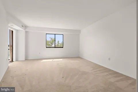 Living - 15100 Interlachen Dr #4-918, Silver Spring, MD 20906 photo 6 of 8