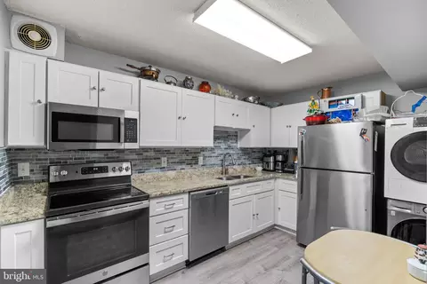 Kitchen - 15101 Interlachen Dr #1-1022, Silver Spring, MD 20906 photo 1 of 2