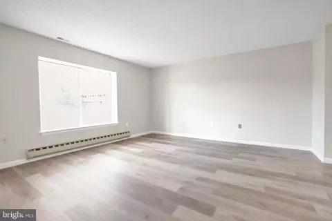 Living - 15121 Glade Dr #13-2F, Silver Spring, MD 20906 photo 6 of 6