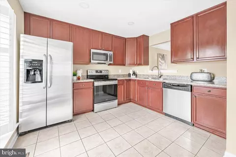 Kitchen - 1936 Flowering Tree Ter, Silver Spring, MD 20902 photo 2 of 2