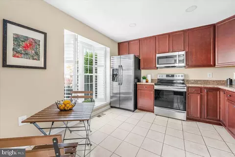 Kitchen - 1936 Flowering Tree Ter, Silver Spring, MD 20902 photo 1 of 2
