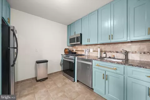 Kitchen - 10859 Amherst Ave #202, Silver Spring, MD 20902 photo 5 of 6