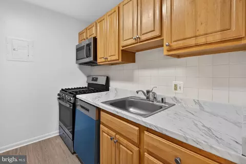 Kitchen - 3834 Bel Pre Rd #3834-1, Silver Spring, MD 20906 photo 2 of 2