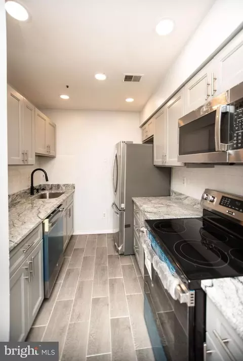 Kitchen - 13408 Shady Knoll Dr #308, Silver Spring, MD 20904 photo 1 of 3