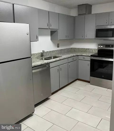 Kitchen - 15101 Interlachen Dr #1-124, Silver Spring, MD 20906 photo 2 of 2