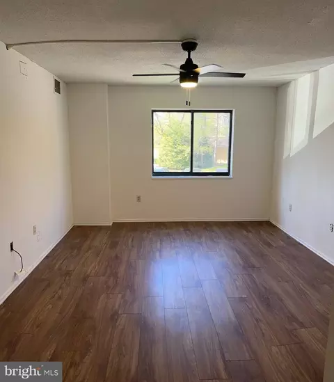 Living - 15101 Interlachen Dr #1-124, Silver Spring, MD 20906 photo 3 of 3