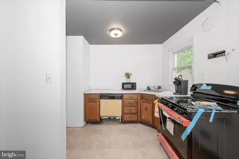 Kitchen - 9813 Braddock Rd, Silver Spring, MD 20903 photo 2 of 3
