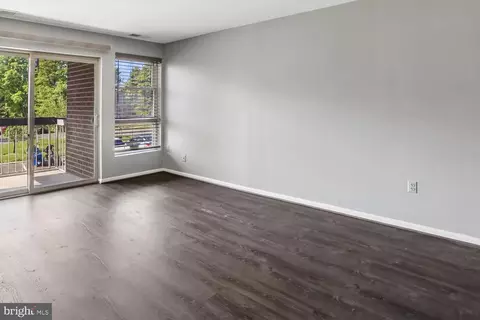 Living - 2201 Greenery Ln #104-11, Silver Spring, MD 20906 photo 2 of 6
