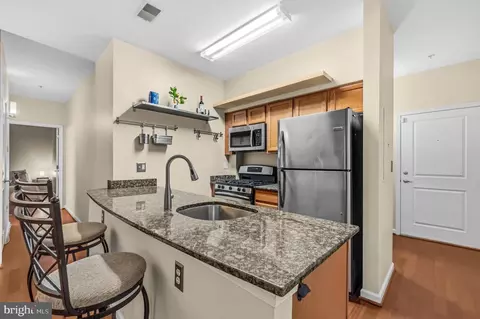 Kitchen - 7923 Eastern Ave #105, Silver Spring, MD 20910 photo 3 of 5