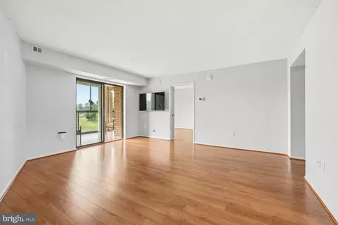 Living - 15101 Interlachen Dr #1-412, Silver Spring, MD 20906 photo 7 of 12