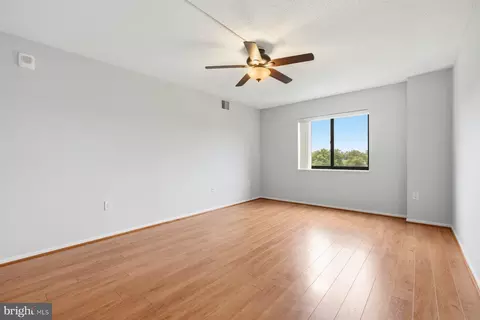 Living - 15101 Interlachen Dr #1-412, Silver Spring, MD 20906 photo 9 of 12