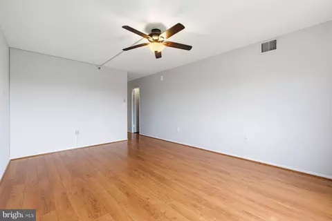 Living - 15101 Interlachen Dr #1-412, Silver Spring, MD 20906 photo 10 of 12