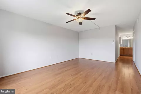 Living - 15101 Interlachen Dr #1-412, Silver Spring, MD 20906 photo 11 of 12